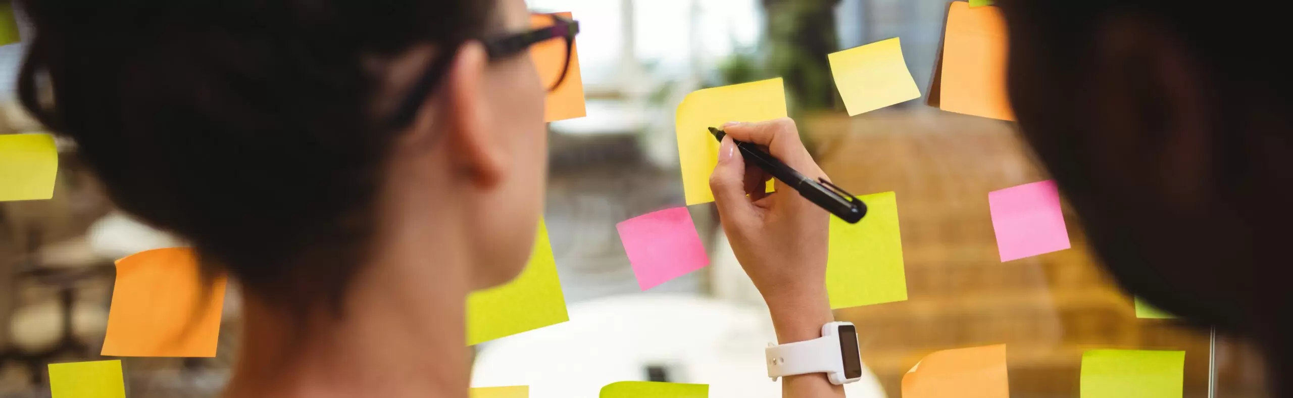 business executives writing on sticky notes scaled 1 - magnettafeln.de - ALLboards